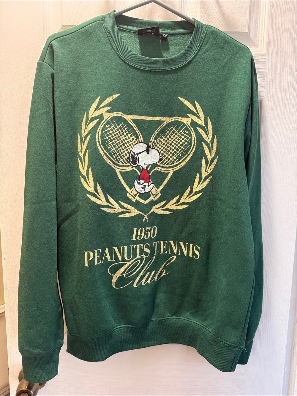 Peanuts Green Crewneck Sweatshirt with Snoopy Tennis Graphic